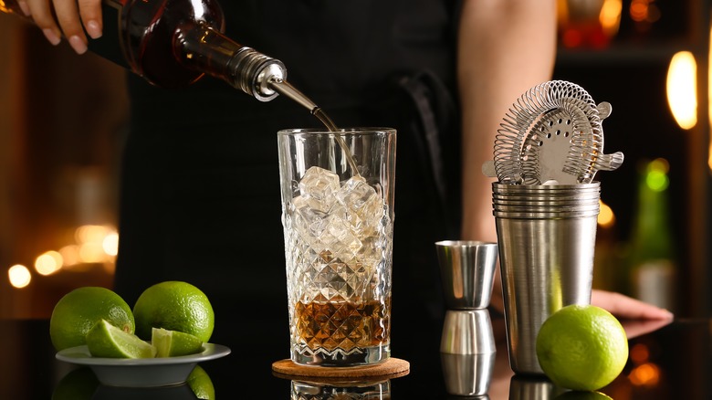 female bartender takes drink order