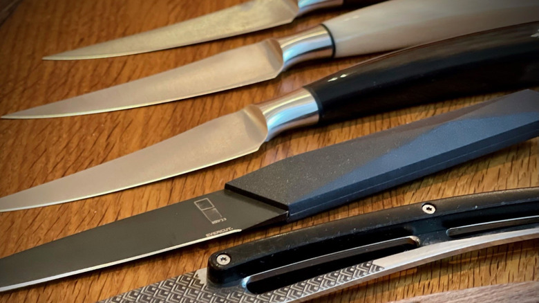An array of steak knives.