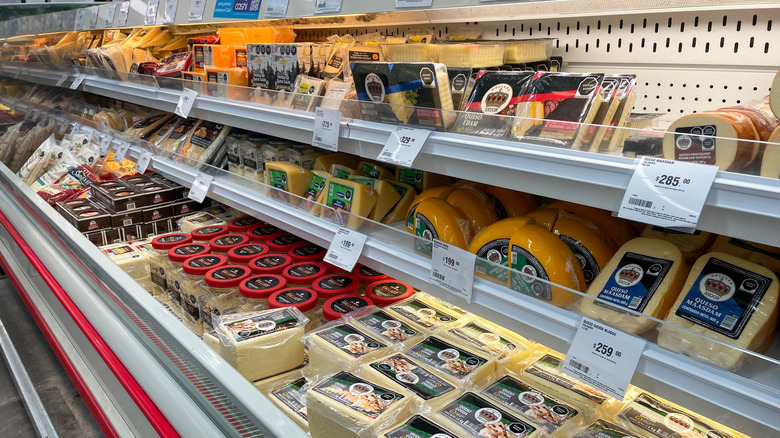 Refrigerated cheese aisle inside Costco store