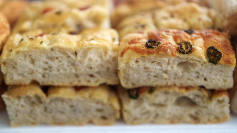 Upclose shots of sliced hunks of focaccia bread