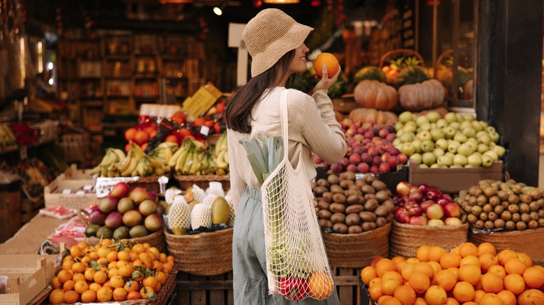 Woman at fruit stand