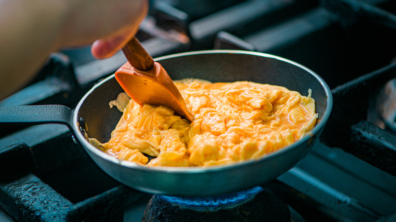 scrambling eggs in a nonstick pan