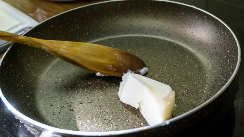 melting lard in frying pan