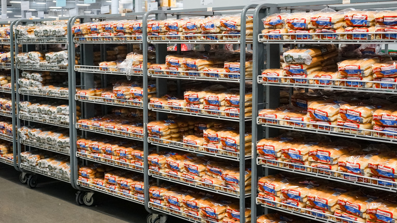 Bakery display of packaged breads inside Costco