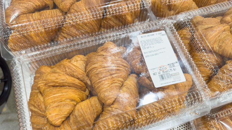 Boxes of Costco Bakery Butter Croissants on display in store