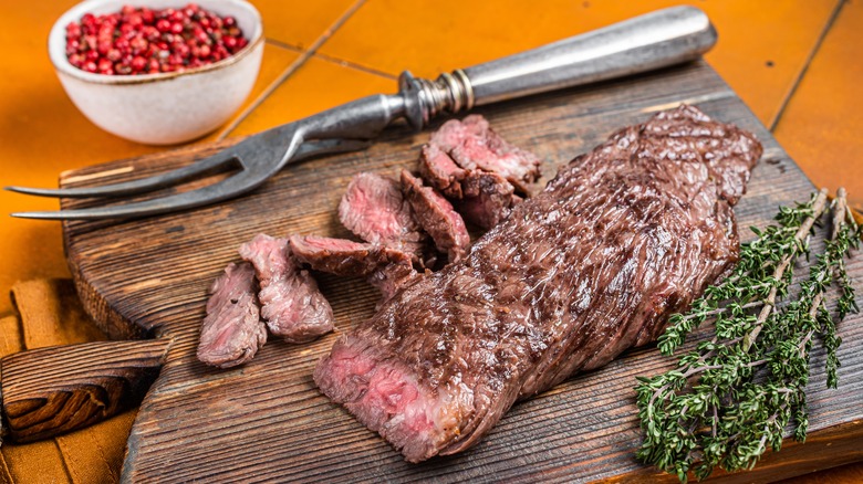 Grilled skirt steak on a cutting board