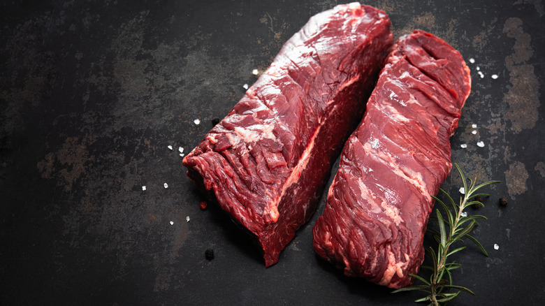hanger steak on black background