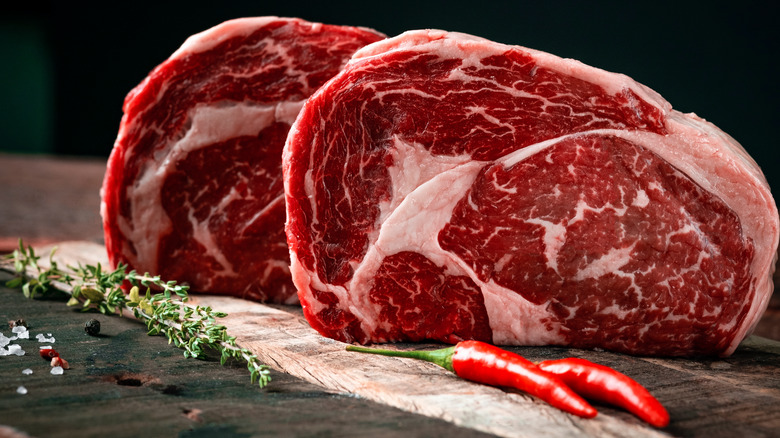 ribeye steaks with fresh chilis
