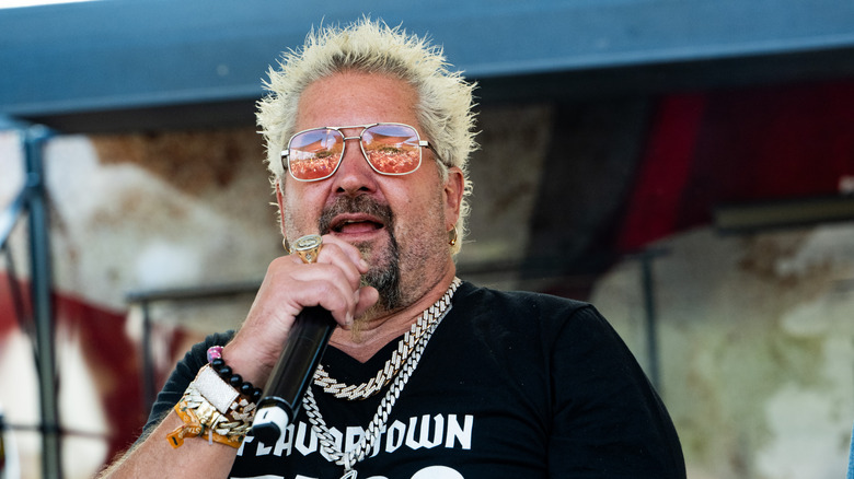Guy Fieri speaking at an event