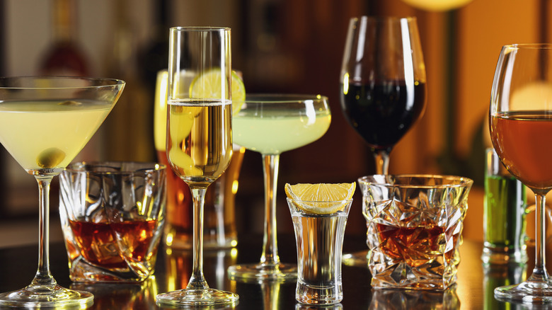 wine, beer, and various cocktails on a bar