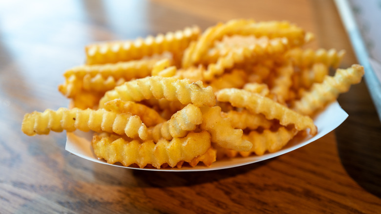 Shake Shack crinkle fries in a paper basket