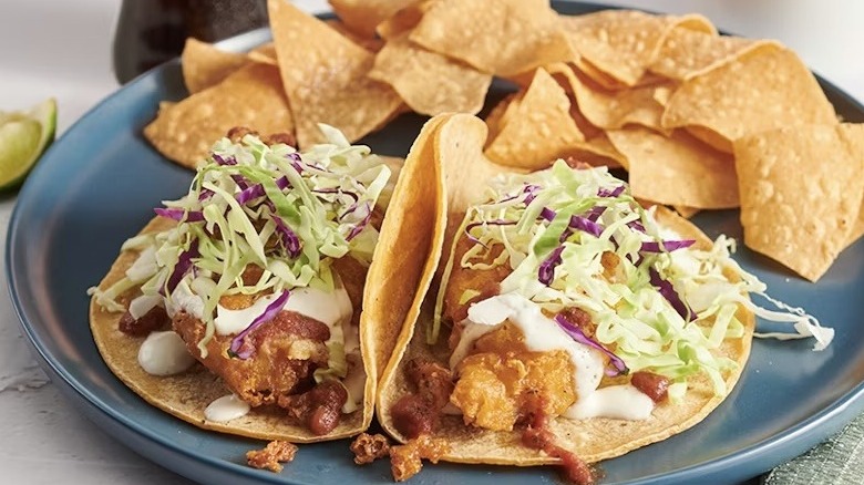Plate of Rubio's Original Fish Tacos served with toritlla chips