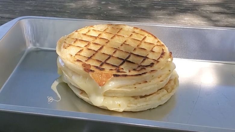 An Eggo grilled cheese on a pan.