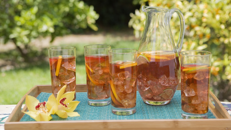 Tray with pitcher and glasses of iced tea