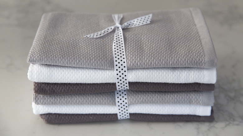 A stack of neatly folded kitchen towels
