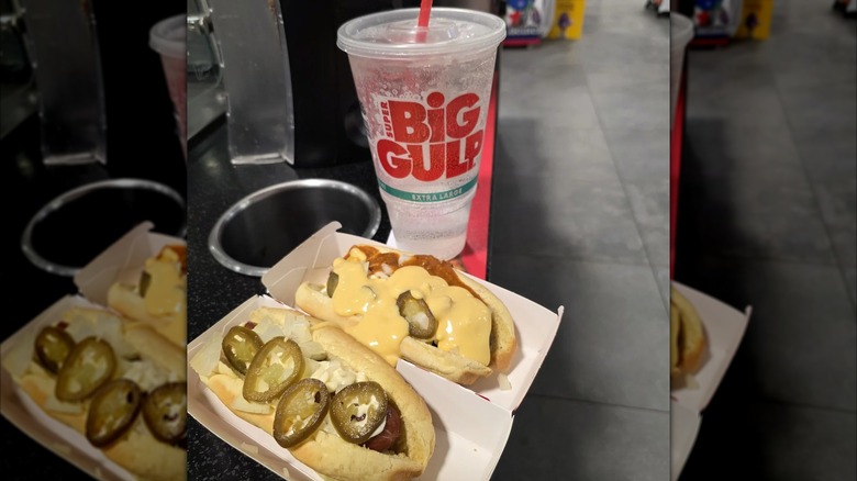 Two 7-Eleven hot dogs and a Big Gulp soda