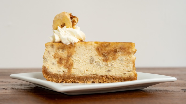 Slice of bananas foster cheesecake
