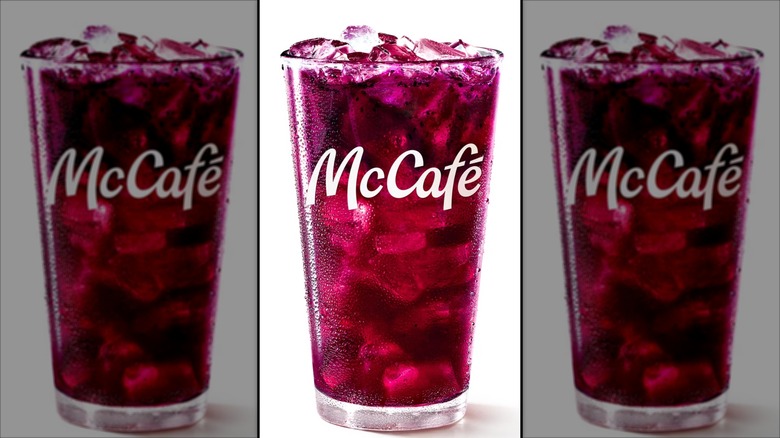 A glass filled with Blackberry Passion Fruit Refresher from McDonald's