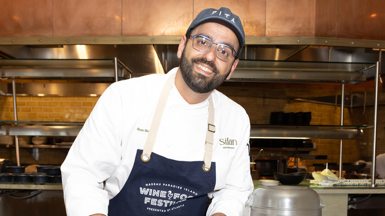 Chef Alon Shaya in the kitchen at Nassau Paradise Island Wine and Food Fest