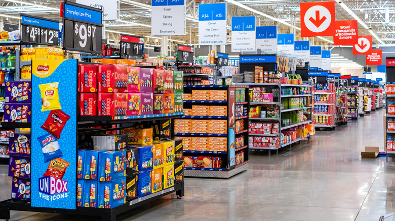 Walmart interior showing products displayed at end of aisles
