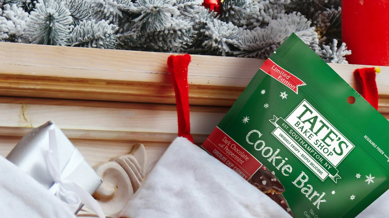 A bag of Tate's Cookie Bark on a Christmas backdrop