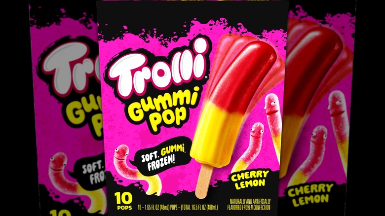 A box of Cherry Lemon Trolli Gummi Pops against a black background