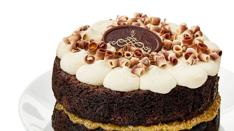 A Marketside Dubai-Style Chocolate Cake sits on a white plate