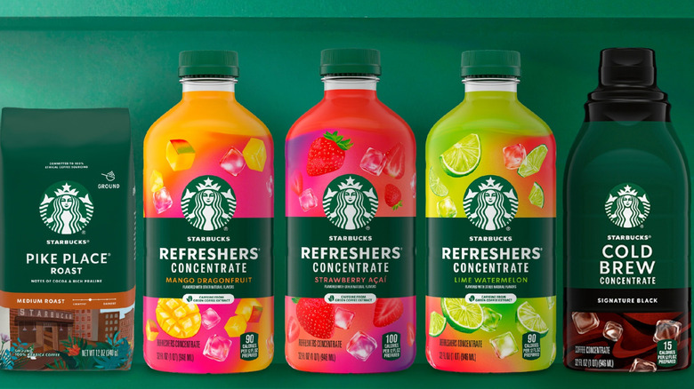 Several Refreshers Concentrates sitting next to coffee.