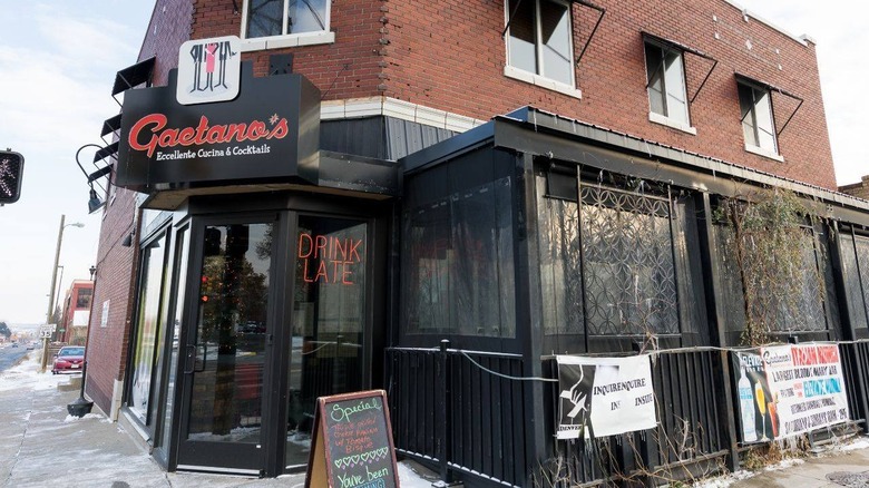 View of Gaetano's entrance in a brick building