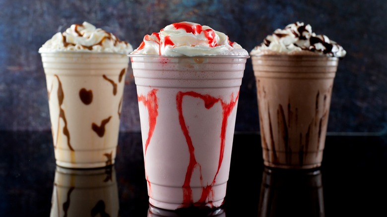 three milkshakes with syrup