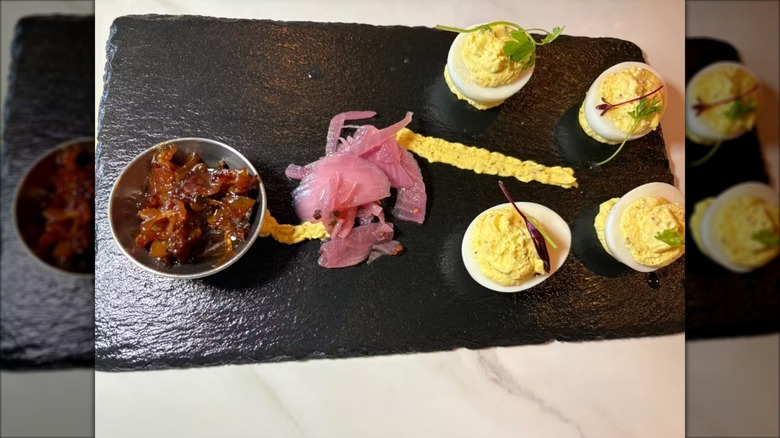 A plate of deviled eggs from Que-Riosity