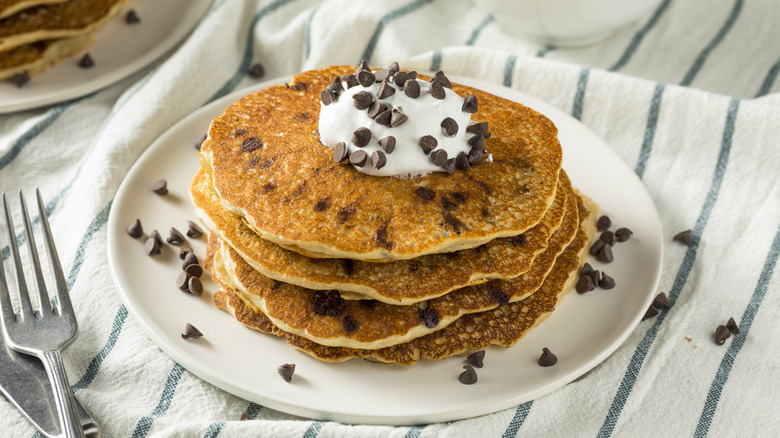 A plate of chocolate chip pancakes