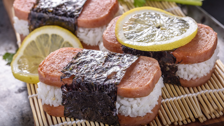 Hawaiian Spam musubi with rice, nori and lemon slices