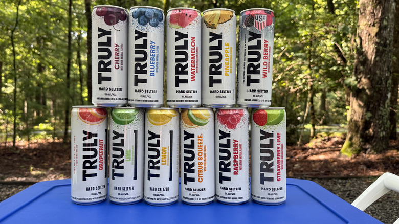 Multiple cans of Truly hard seltzer topped in two rows.
