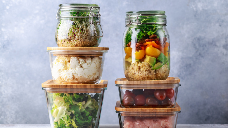 assortment of foods stored in glass containers
