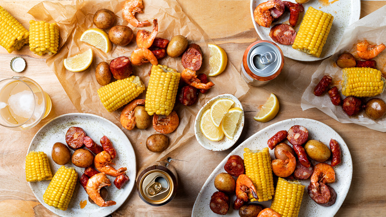 A Low Country boil spread on plates and paper