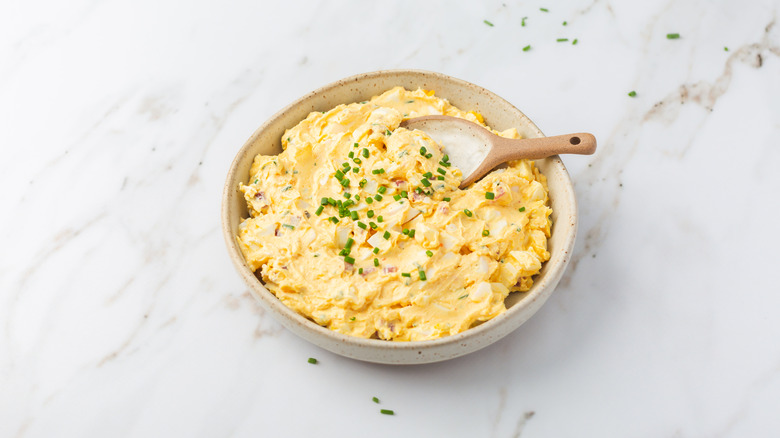 A bowl of egg salad.