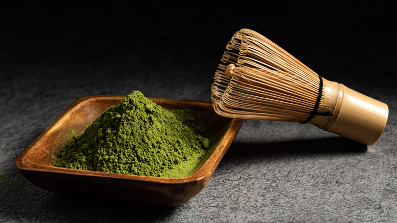 matcha whick and matcha in wooden container