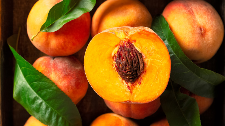 top view of peaches in wooden box