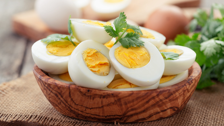 sliced hardboiled eggs with parsley