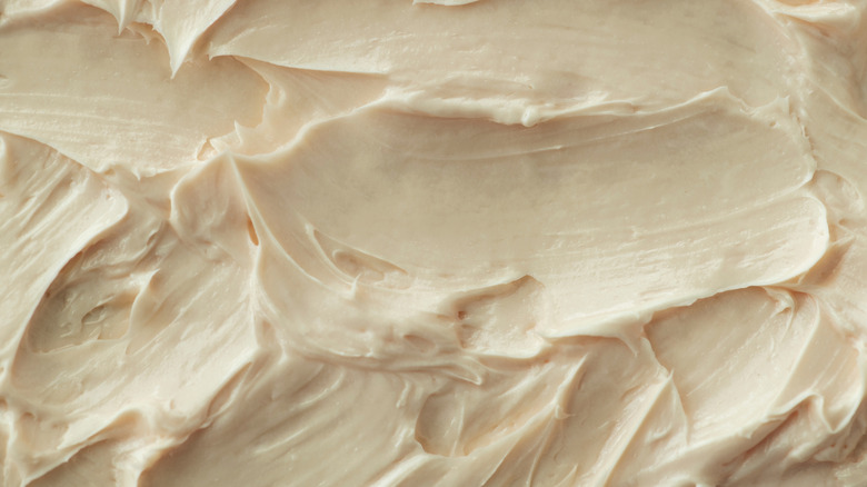 Close up of thick vanilla frosting
