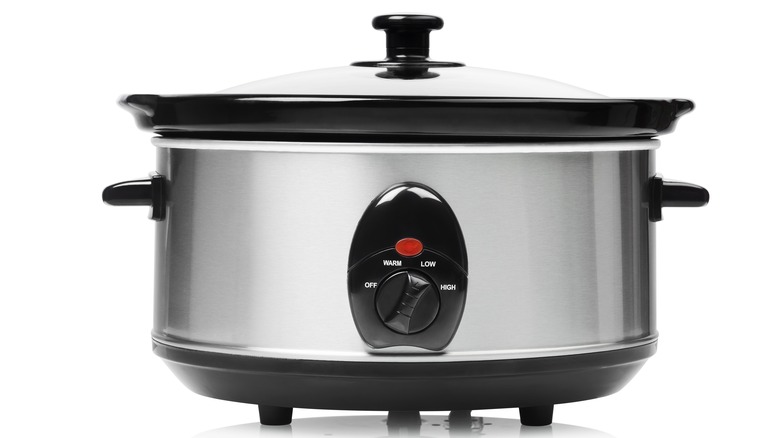 Slow cooker on white background