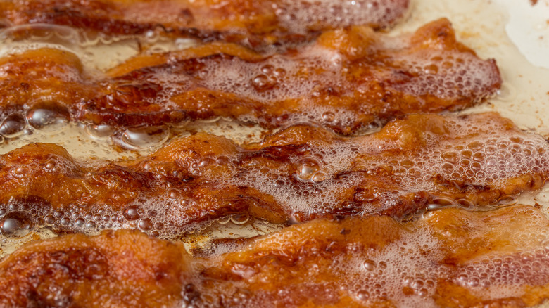 Sizzling pan of bacon
