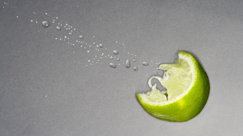 Squeezed lime wedge