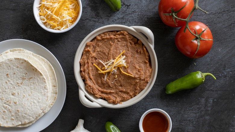 Refried beans with condiments