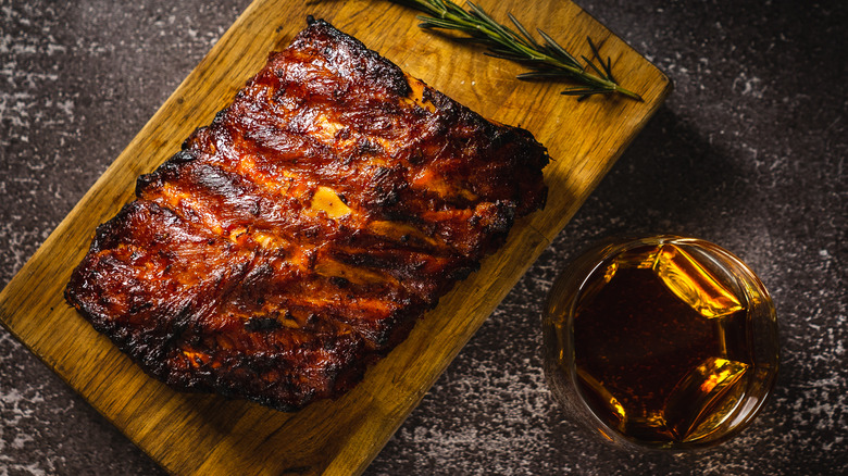 Barbecue pork ribs and glass of whiskey
