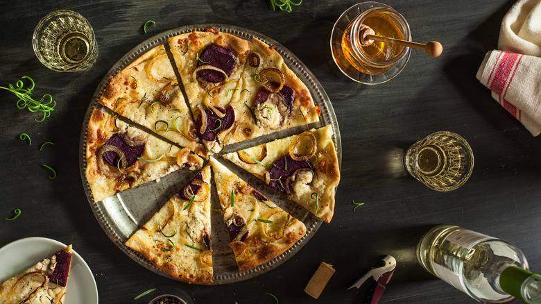 white wine with pizza slices
