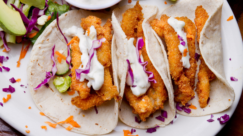 fish tacos wrapped in tortillas
