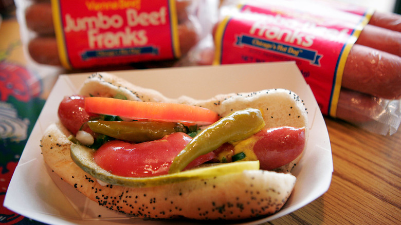 Package of Vienna Beef prepared into a Chicago-style hot dog.