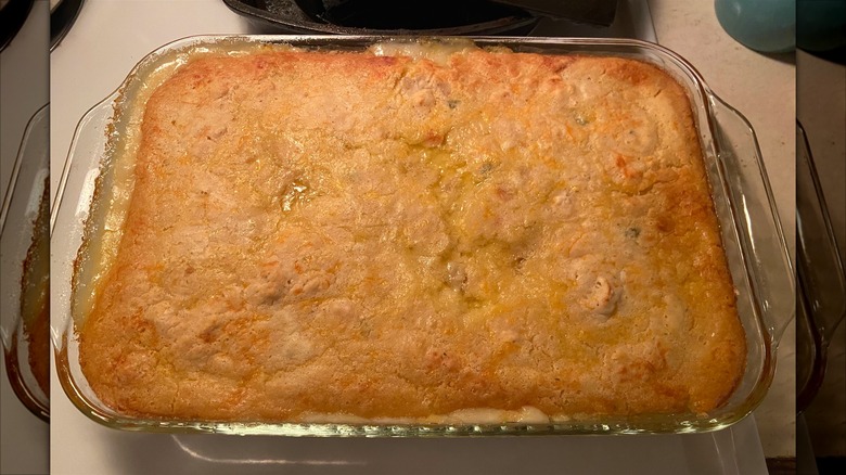 chicken cobbler displayed on clear glass casserole dish
